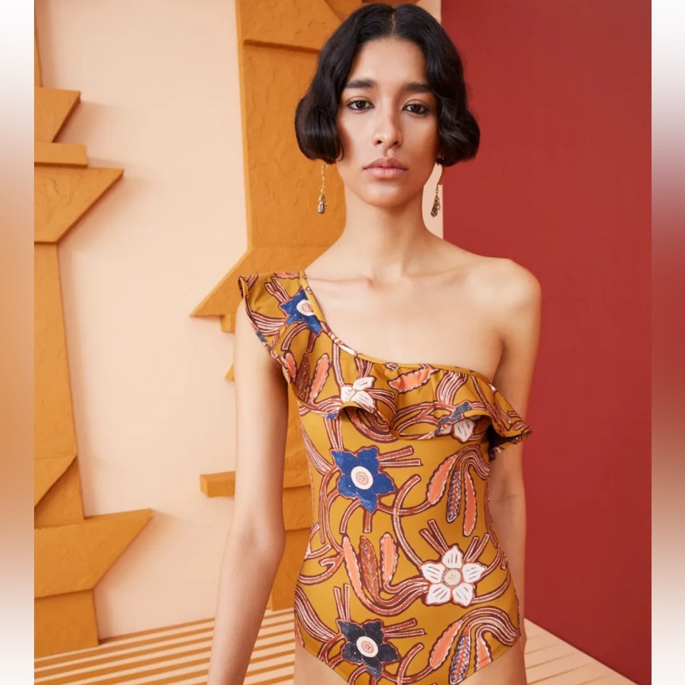 Swim She suit and matching cover up. Brand new, size medium.